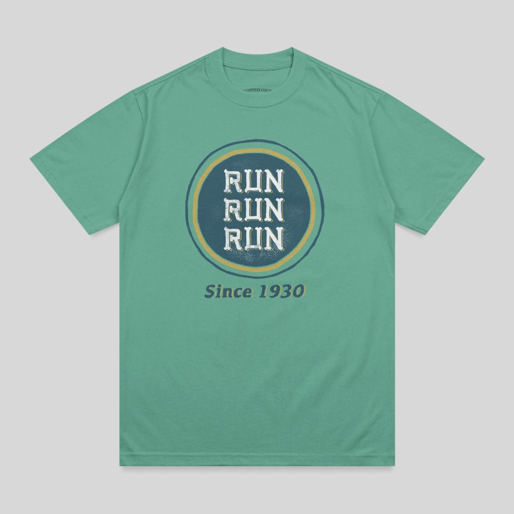 Green t-shirt with circular "RUN RUN RUN" logo and "Since 1930" text.