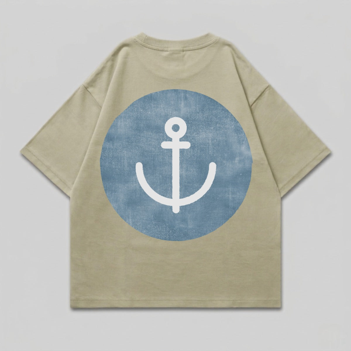 Tan t-shirt with a blue circle containing a white anchor graphic on the back.