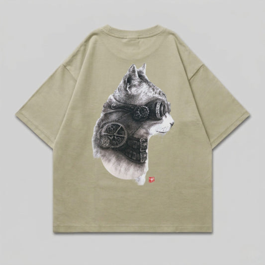 Steampunk cat head graphic on khaki t-shirt.