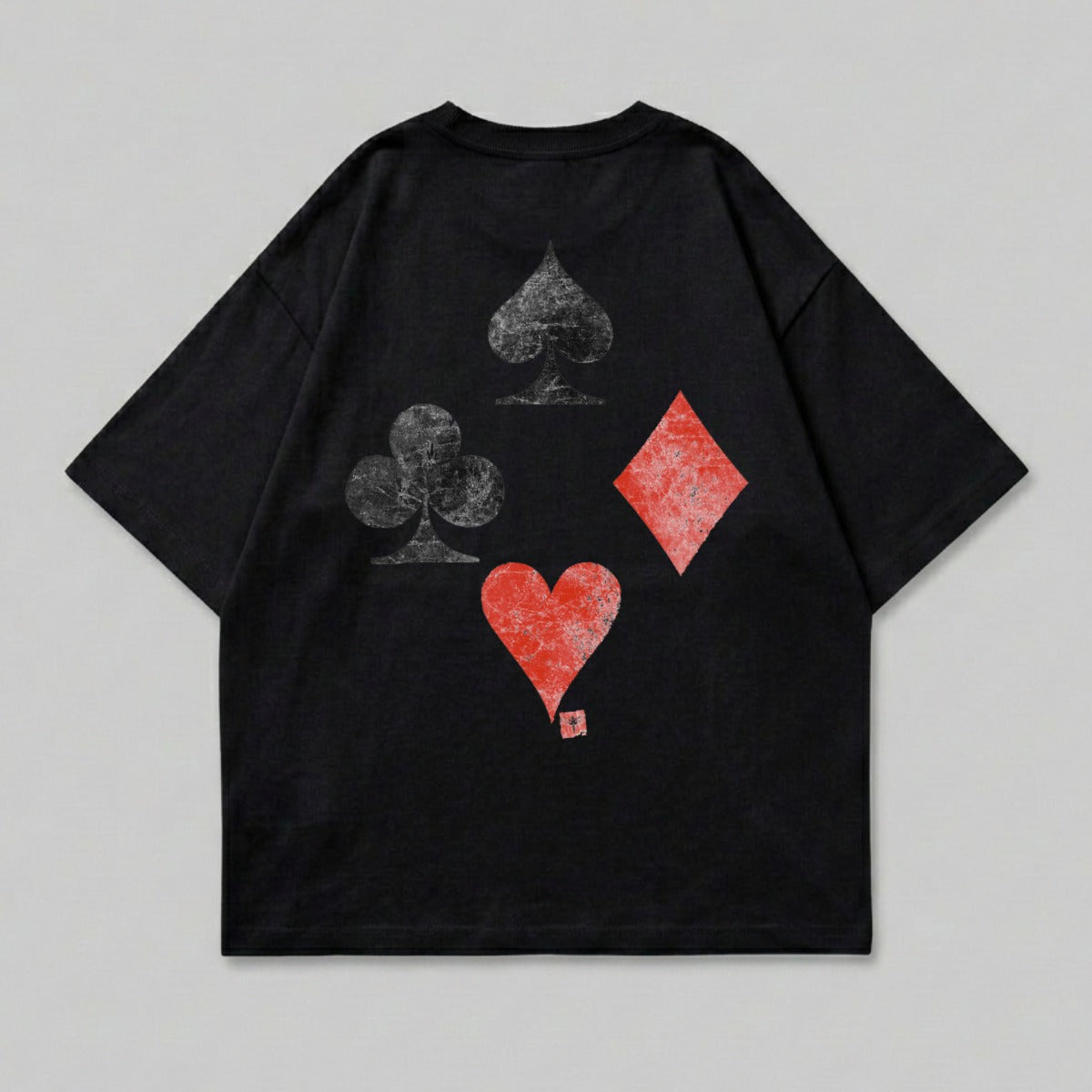 Black t-shirt with distressed playing card suit designs: spades, clubs, diamonds, and heart.