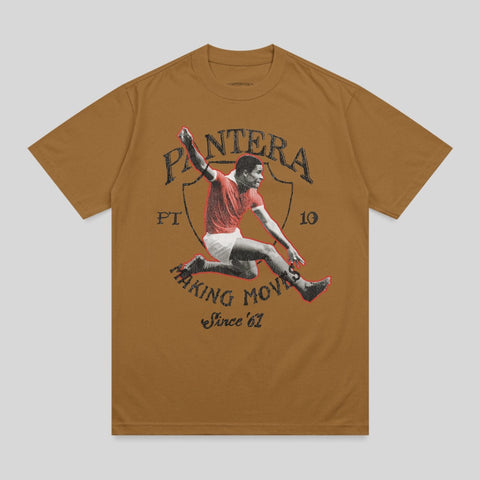 Brown t-shirt with graphic of jumping soccer player and "Pantera Making Moves Since '67".