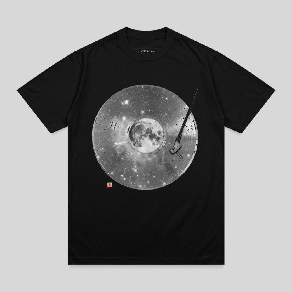 Black t-shirt with a circular graphic of a moon and stars on a vinyl record.