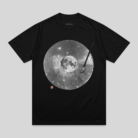 Black t-shirt with a circular graphic of a moon and stars on a vinyl record.