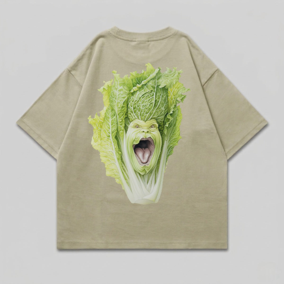 T-shirt with a cartoon cabbage monster face on the back.