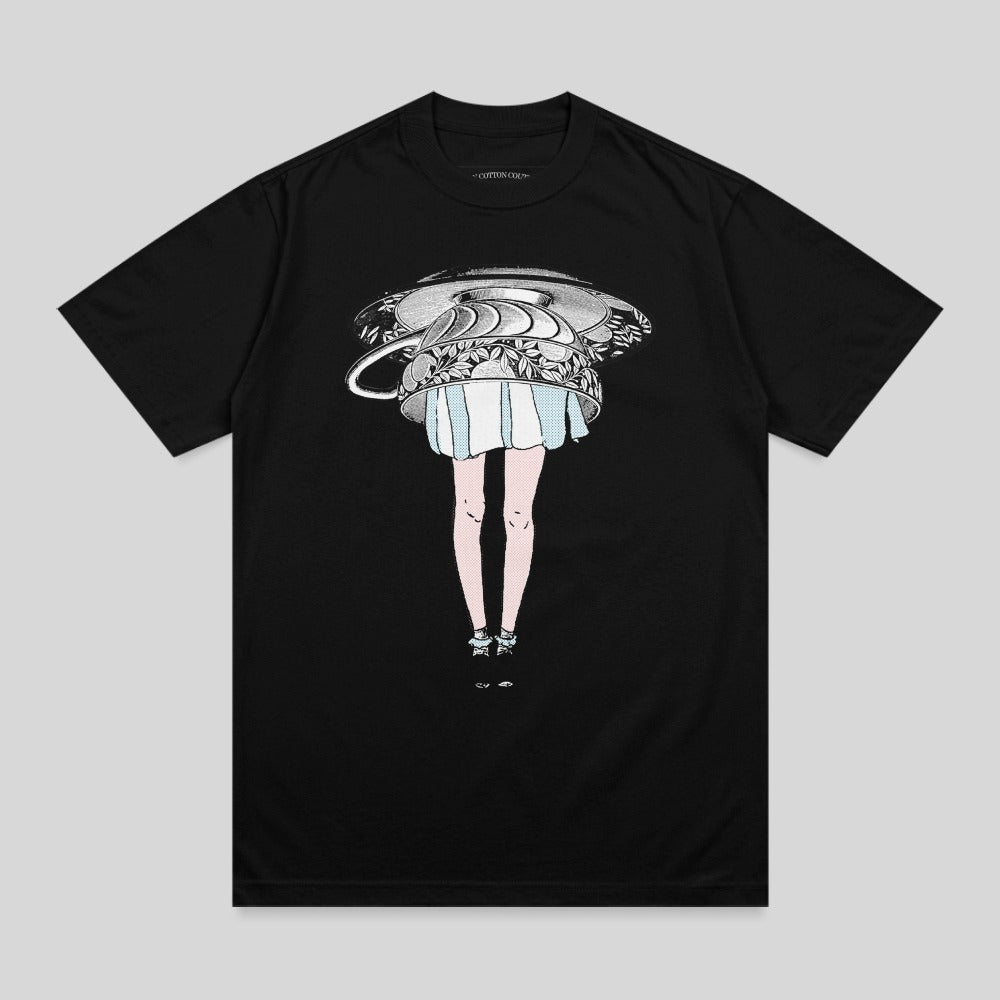 Black t-shirt with a woman's legs and a large upside-down silver bowl on a black background.