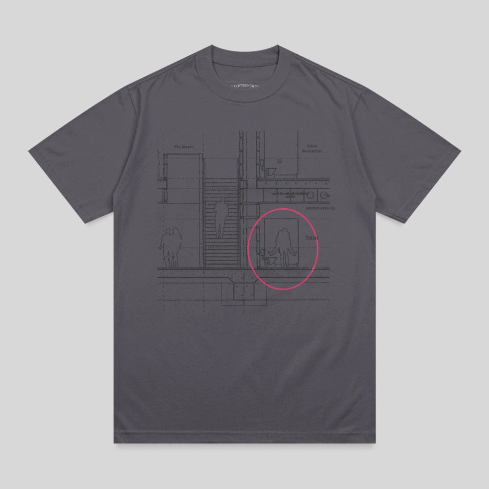 Blueprint schematic of a building interior with a pink circle highlighting a toilet stall.