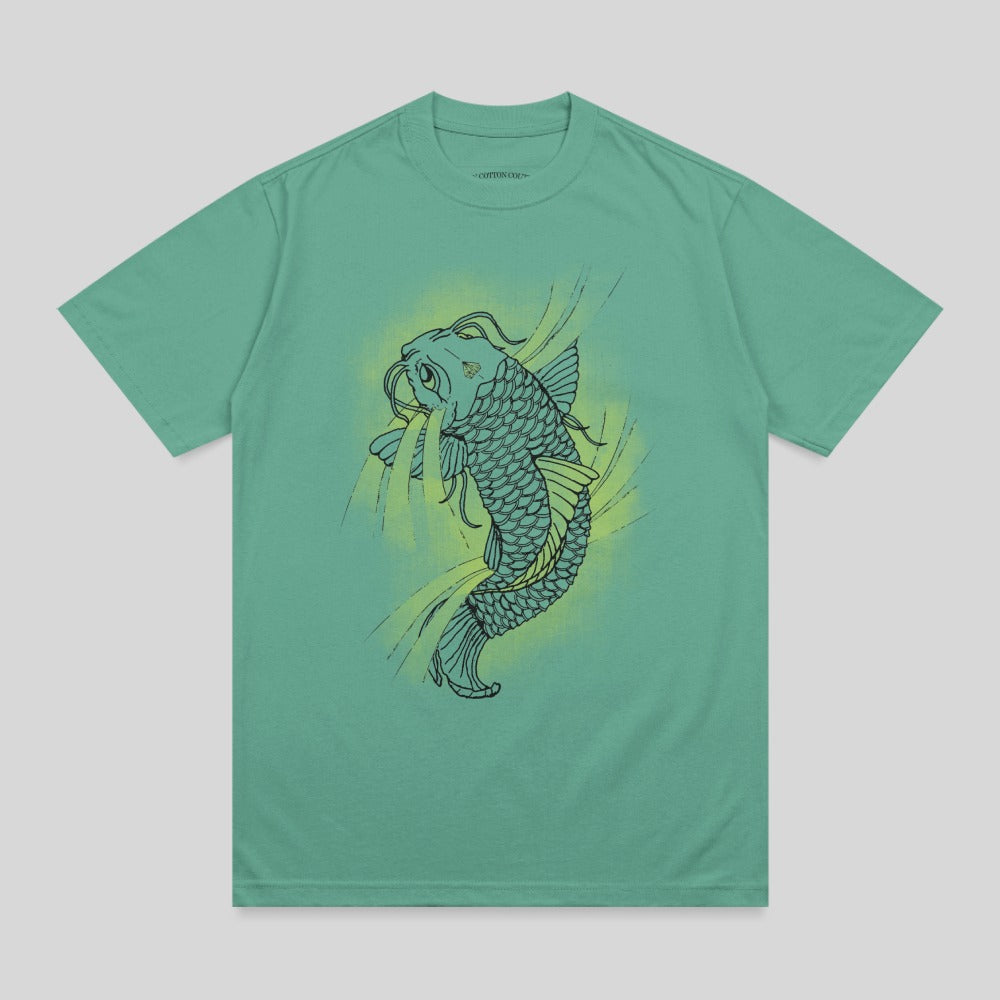 Green t-shirt with a graphic of a stylized koi fish in yellow and black.