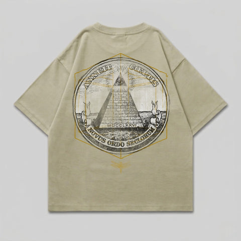 Beige t-shirt with "Annuit Coeptis Novus Ordo Seclorum" and pyramid design.