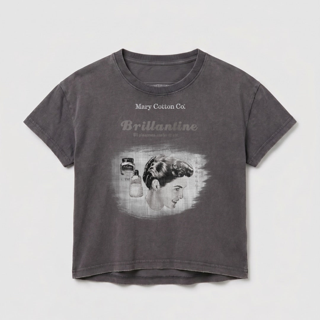 Grey t-shirt with "Mary Cotton Co." and "Brillantine" text and vintage hair product graphic.
