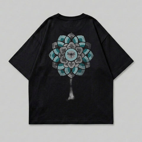 Black t-shirt with a large, grey and teal mandala design on the back.
