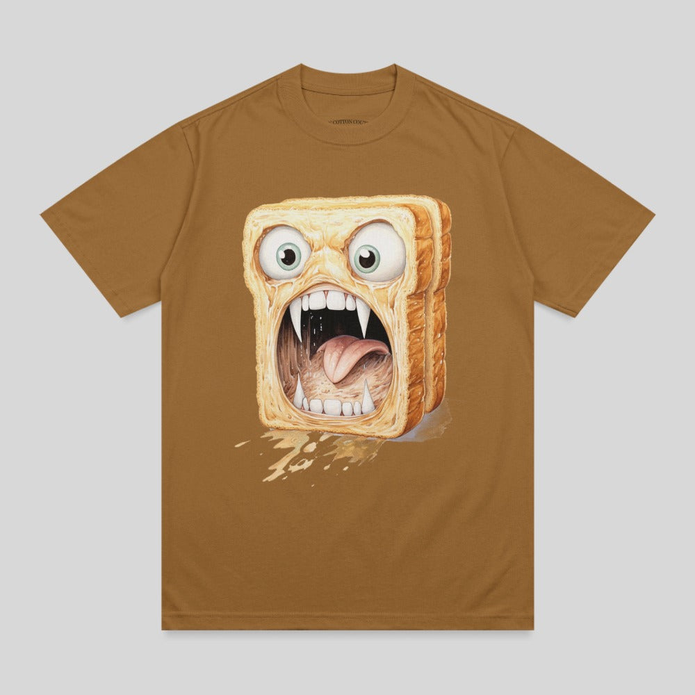 Brown t-shirt with cartoon of screaming toast with sharp teeth and wide eyes.