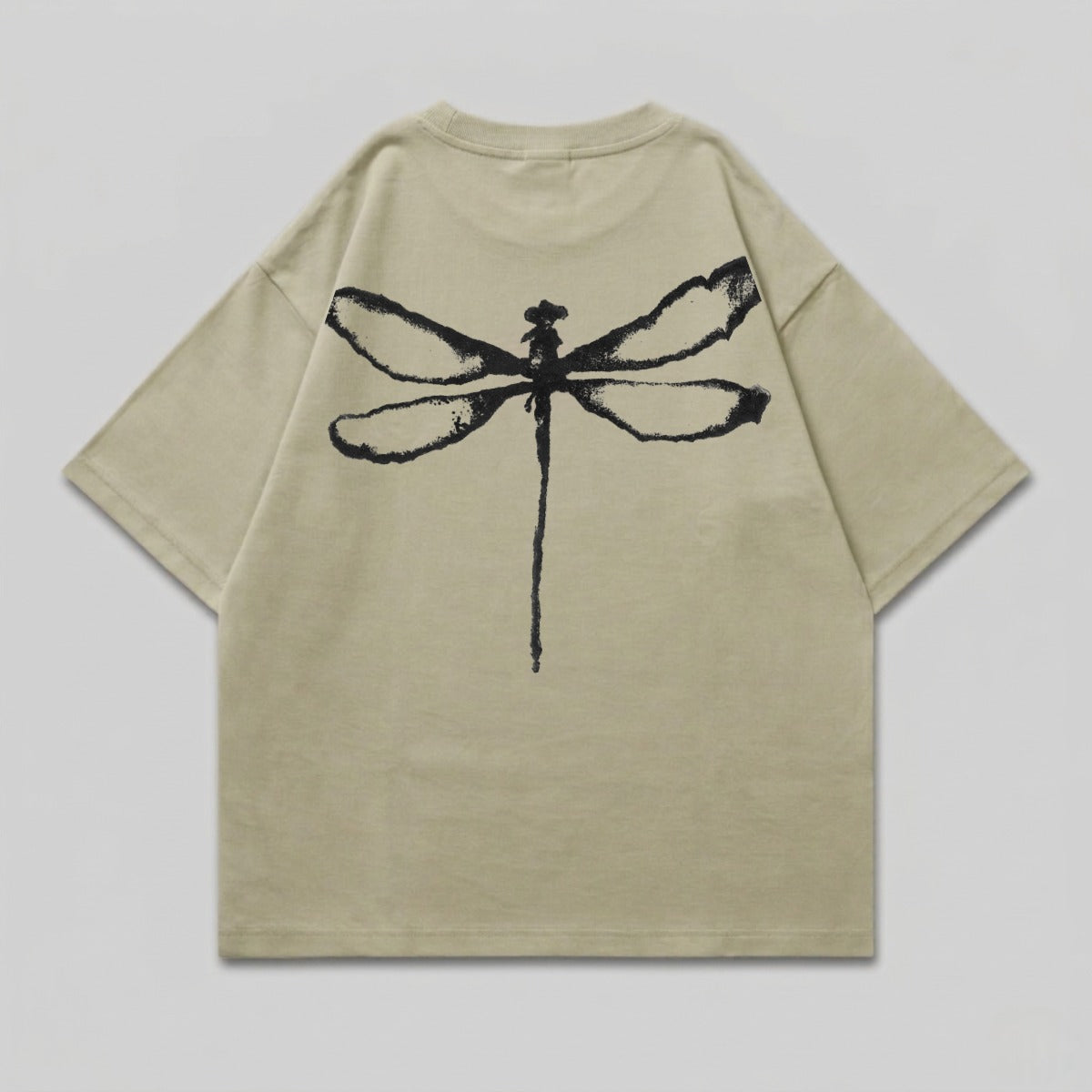 Tan t-shirt with a black dragonfly graphic on the back.