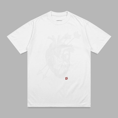 White t-shirt with a white anatomical heart and crossed arrows graphic.