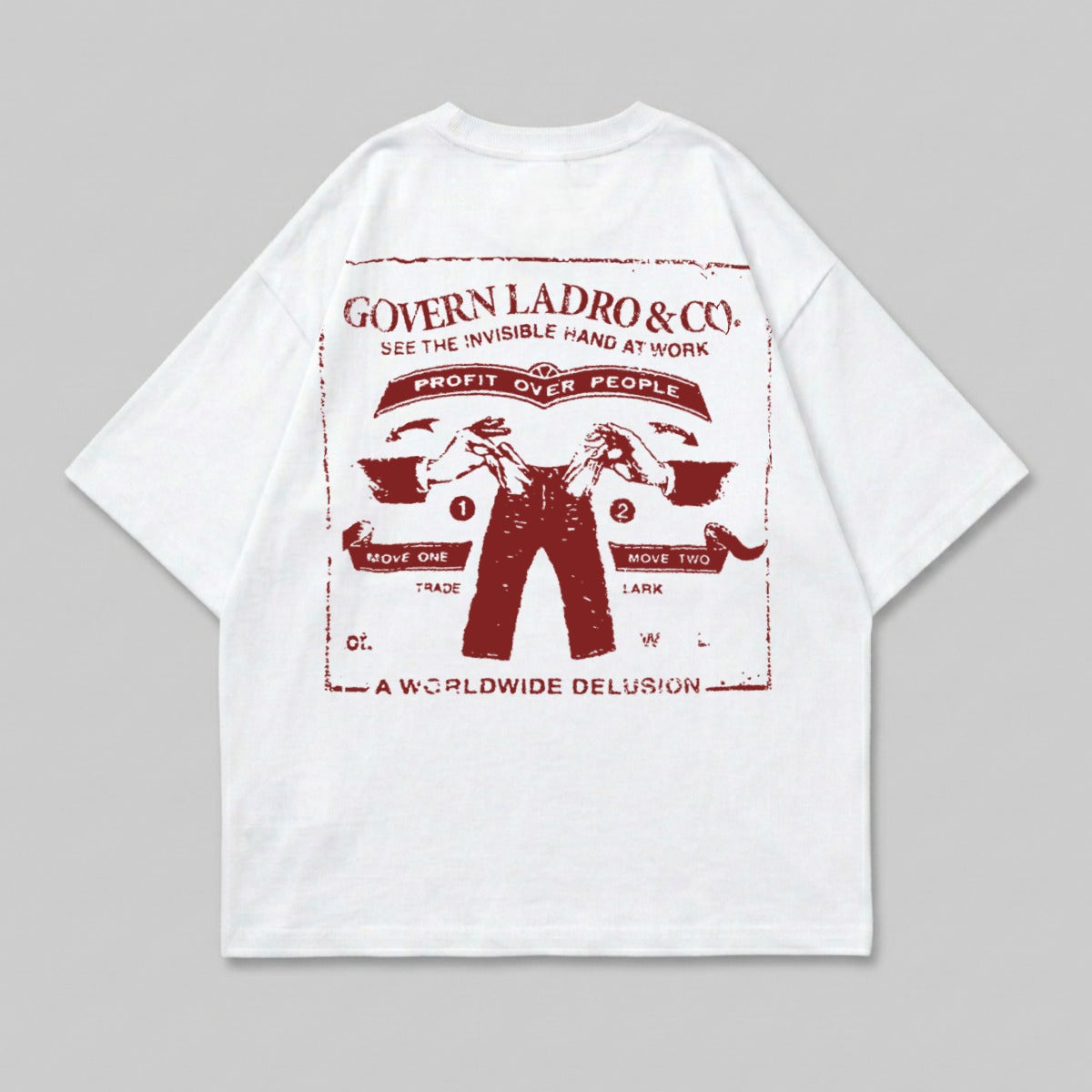 T-shirt with red graphic of hands holding tools, "Govern Ladro & Co." and "A Worldwide Delusion" text.