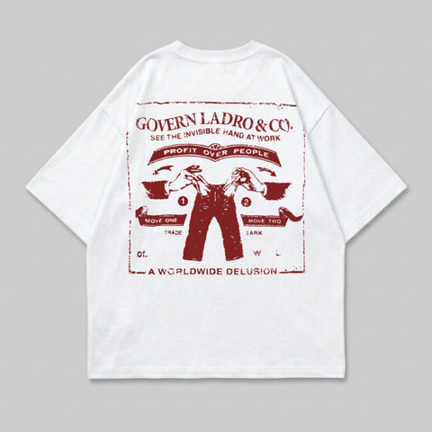 T-shirt with red graphic of hands holding tools, "Govern Ladro & Co." and "A Worldwide Delusion" text.