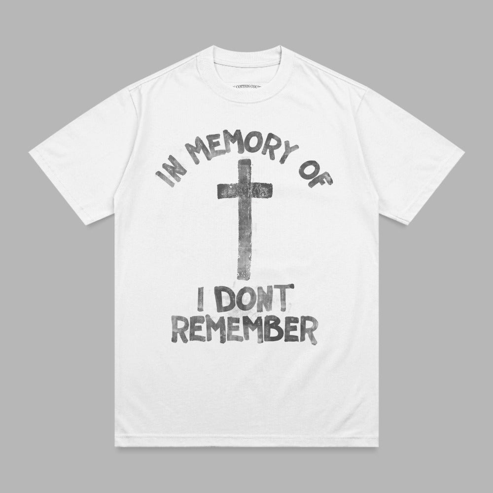 White t-shirt with black "IN MEMORY OF I DONT REMEMBER" and cross graphic.