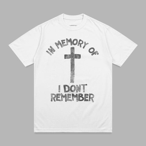 White t-shirt with black "IN MEMORY OF I DONT REMEMBER" and cross graphic.