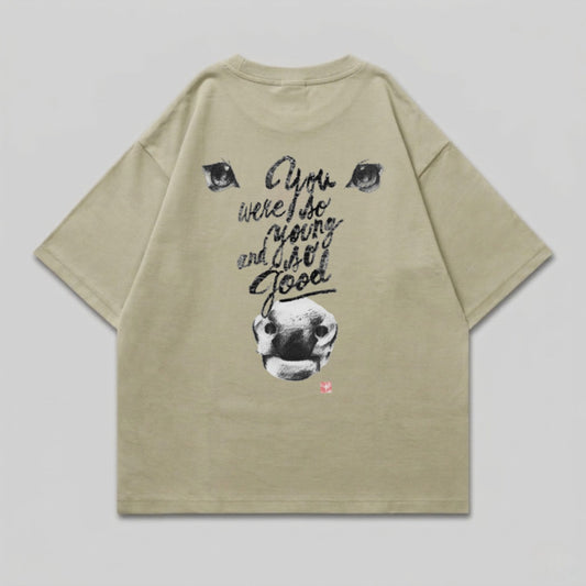 T-shirt with cow graphic and text "You were so young and so good."