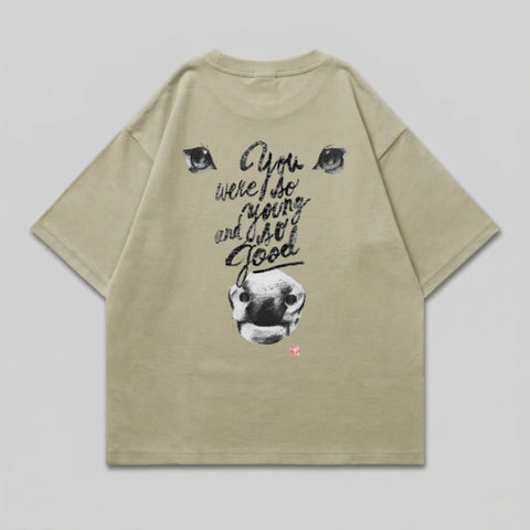 T-shirt with cow graphic and text "You were so young and so good."