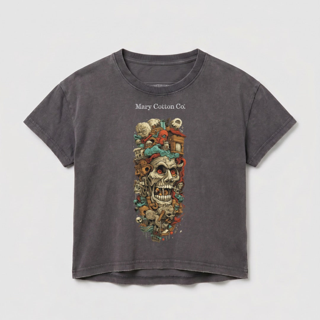 Graphic t-shirt with a skull and surreal elements, "Mary Cotton Co." text.