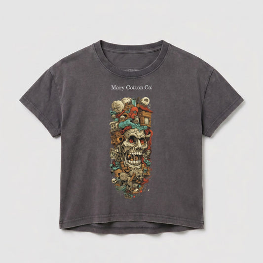 Graphic t-shirt with a skull and surreal elements, "Mary Cotton Co." text.