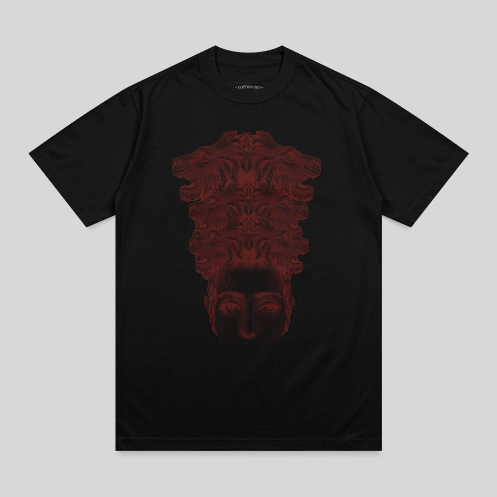 Black t-shirt with a red, abstract, human-like face and lion heads graphic.