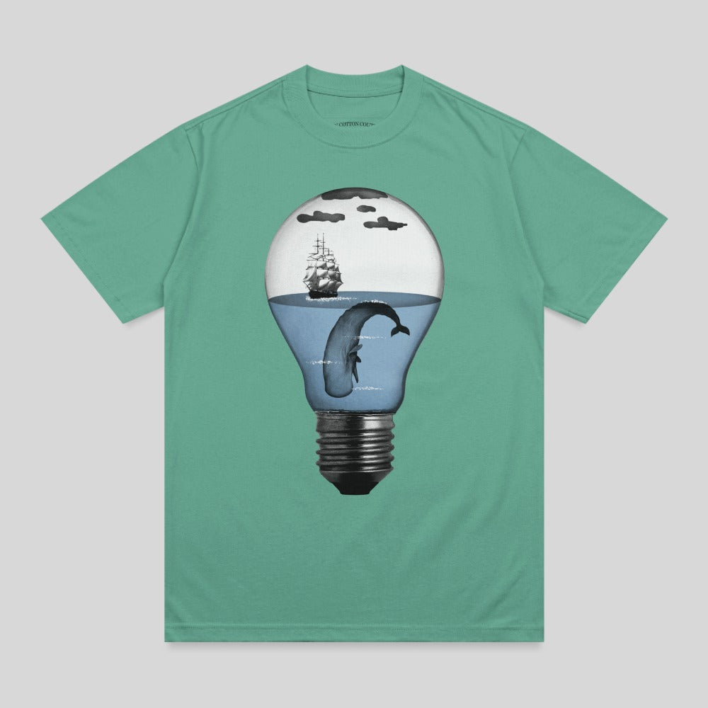 T-shirt with a lightbulb containing a whale and ship in a sea scene.