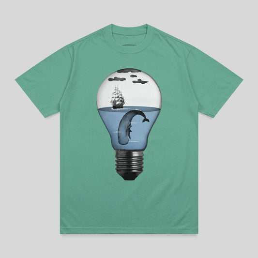 T-shirt with a lightbulb containing a whale and ship in a sea scene.