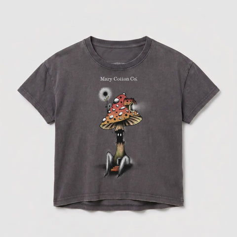 Dark t-shirt with a whimsical mushroom character illustration and "Mary Cotton Co." text.