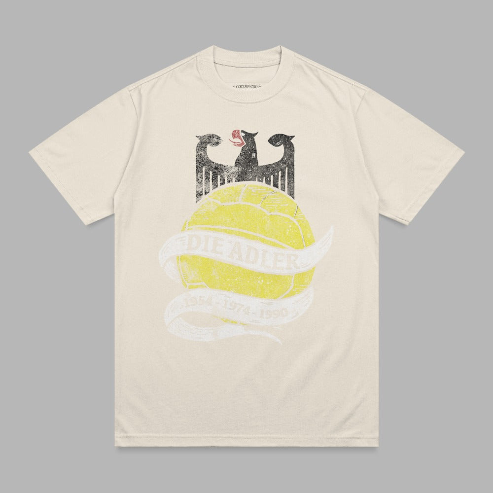 Cream t-shirt with vintage soccer ball and "DIE ADLER 1954-1974-1990" text.