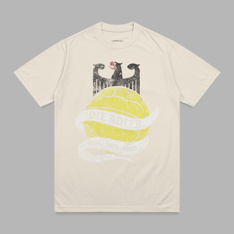 Cream t-shirt with vintage soccer ball and "DIE ADLER 1954-1974-1990" text.