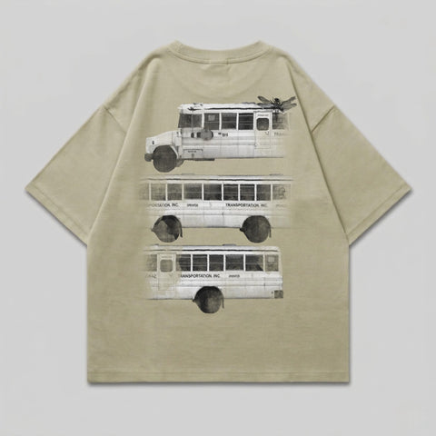 T-shirt with three white school buses stacked vertically, text reads "TRANSPORTATION, INC. OPERATOR".