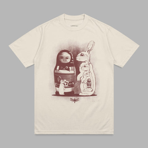 Matryoshka doll and rabbits wearing a gas mask, with a dragonfly.