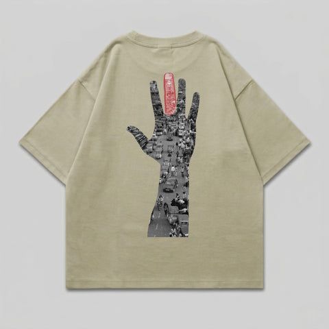 T-shirt with graphic of traffic filling the shape of an open hand.