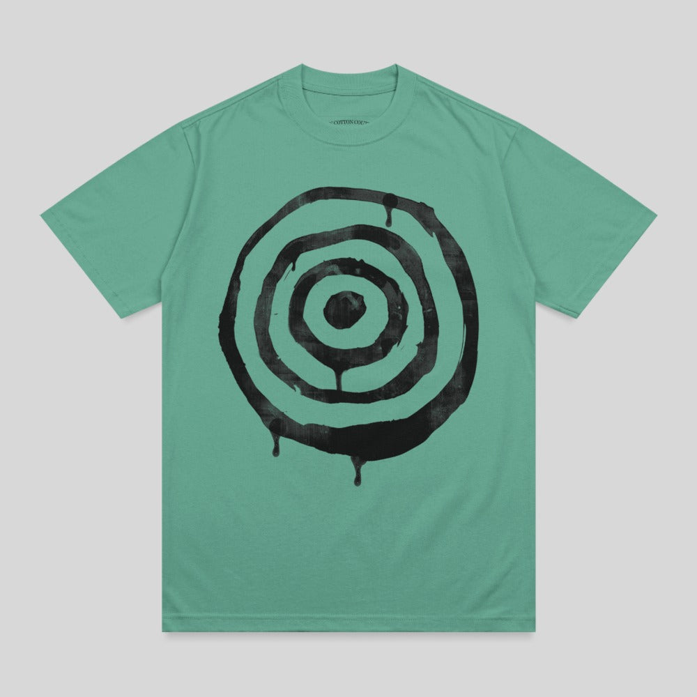 Teal t-shirt with a black concentric circle drip graphic.