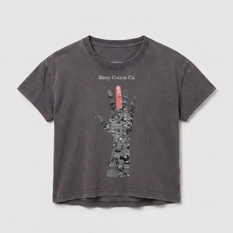 Gray t-shirt with "Mary Cotton Co." and a hand holding a red object over a city street.