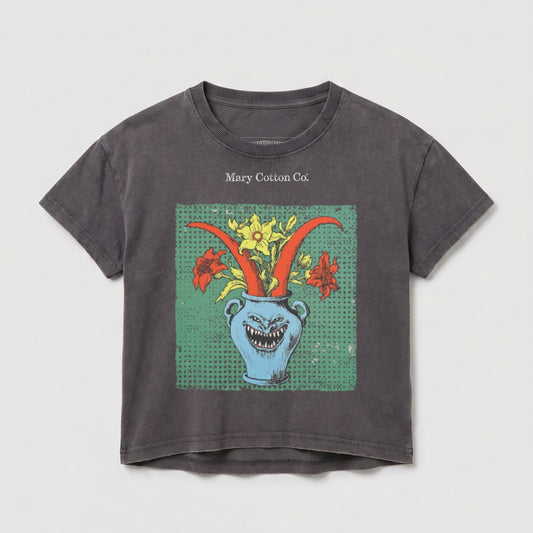 Dark gray t-shirt with blue vase and red and yellow floral graphic.