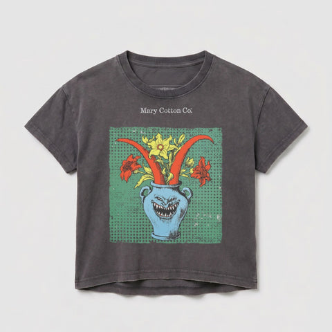 Dark gray t-shirt with blue vase and red and yellow floral graphic.