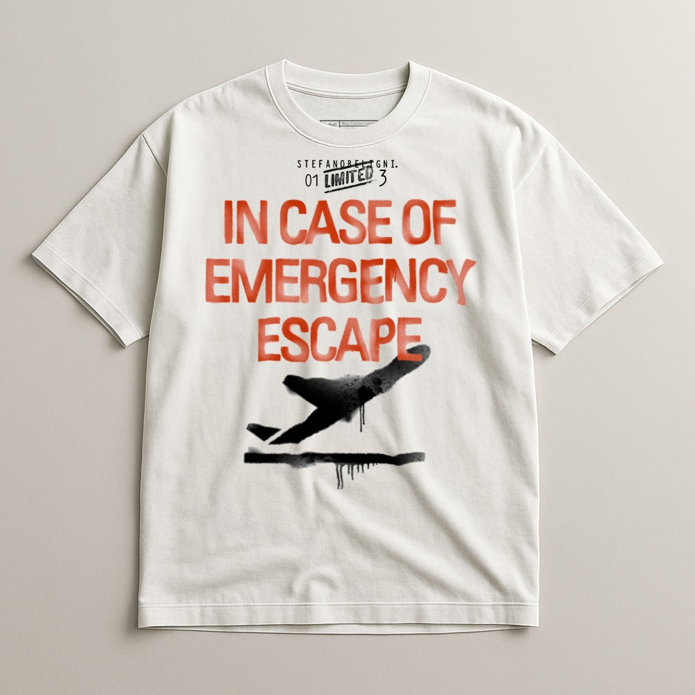 White t-shirt with "IN CASE OF EMERGENCY ESCAPE" and a black airplane graphic.