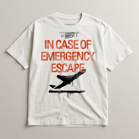 White t-shirt with "IN CASE OF EMERGENCY ESCAPE" and a black airplane graphic.
