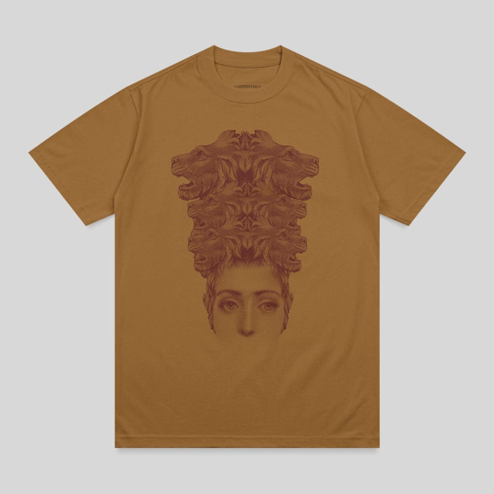 Brown t-shirt with a brown linocut print of a woman's face and multiple lion heads.