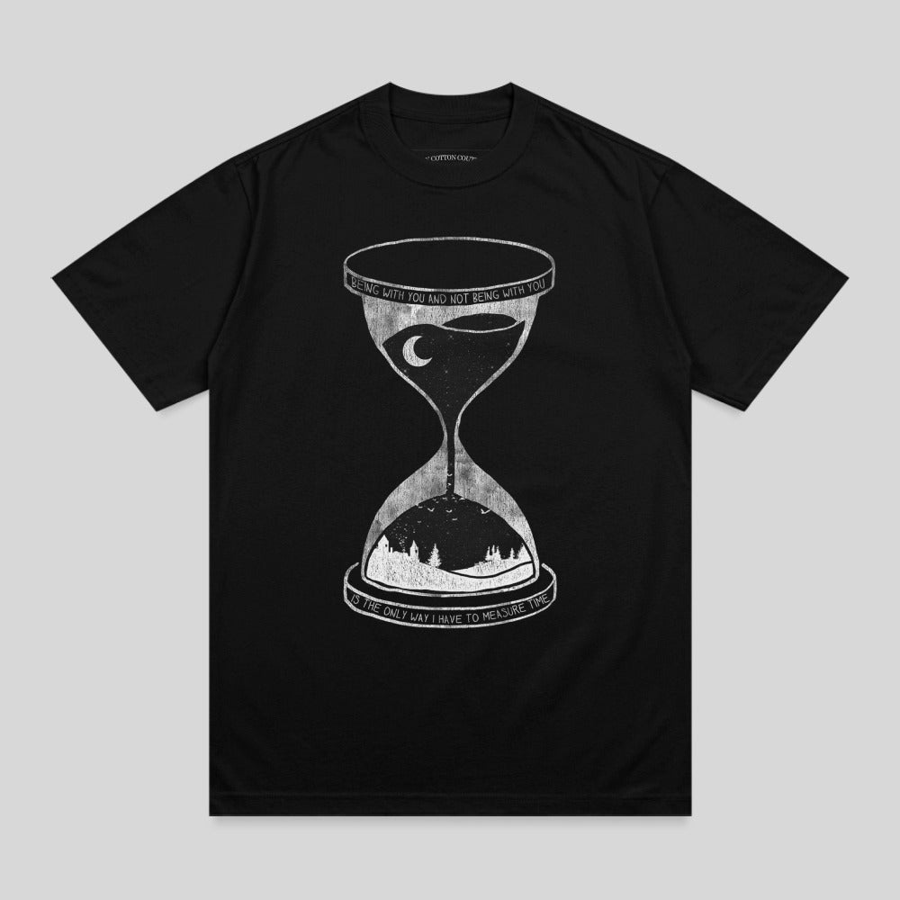 Black t-shirt with hourglass graphic and text "Being with you and not being with you is the only way I have to measure time."