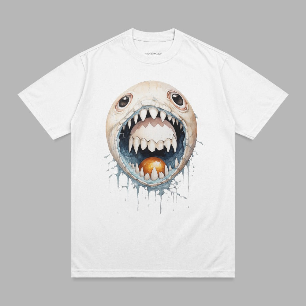 White t-shirt with a cartoon monster's wide open mouth and sharp teeth.