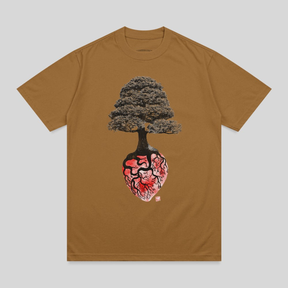 Brown t-shirt with an anatomical heart with a bonsai tree growing from it.