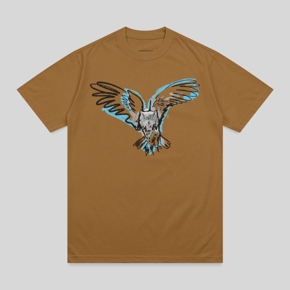 Brown t-shirt with a sketched owl in flight, wings spread.