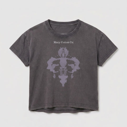 Grey cropped t-shirt with a Rorschach-style ink blot design and "Mary Cotton Co." text.
