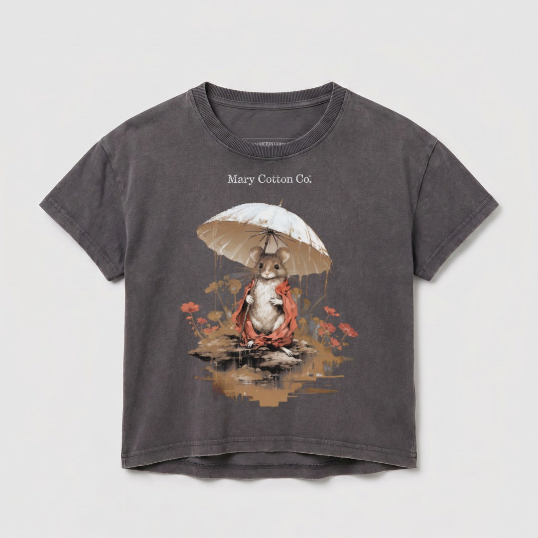 Mouse in raincoat holding umbrella with "Mary Cotton Co." text.