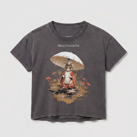 Mouse in raincoat holding umbrella with "Mary Cotton Co." text.