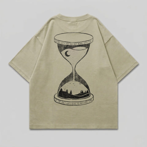 T-shirt with hourglass graphic and text "Being with you and not being with you is the only way I have to measure time."