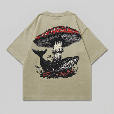 Whale beneath large red mushroom with red foliage.